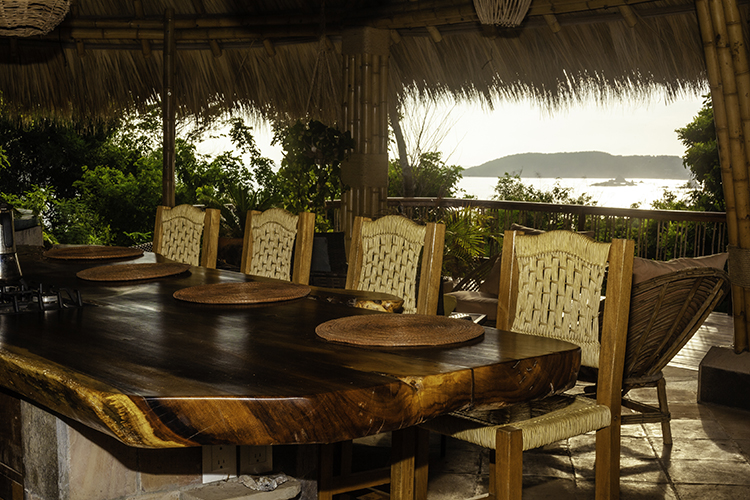 Large table made of local wood with sea view