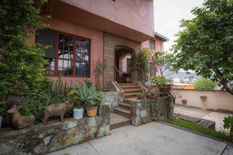 exterior and stone entrance landing at house for sale in San Felipe del Agua