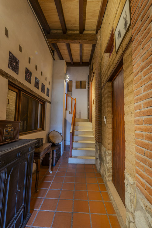 hallway and stairwell of adobe home