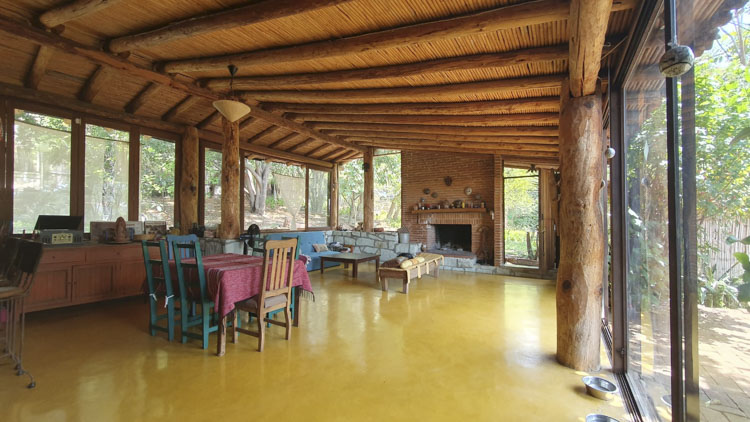 3	Dining room with brick fireplace and chimney