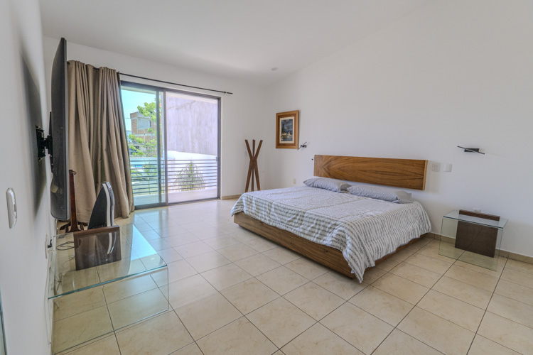 master bedroom with balcony