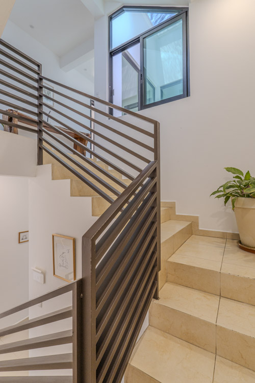 stairwell with sturdy metal railing