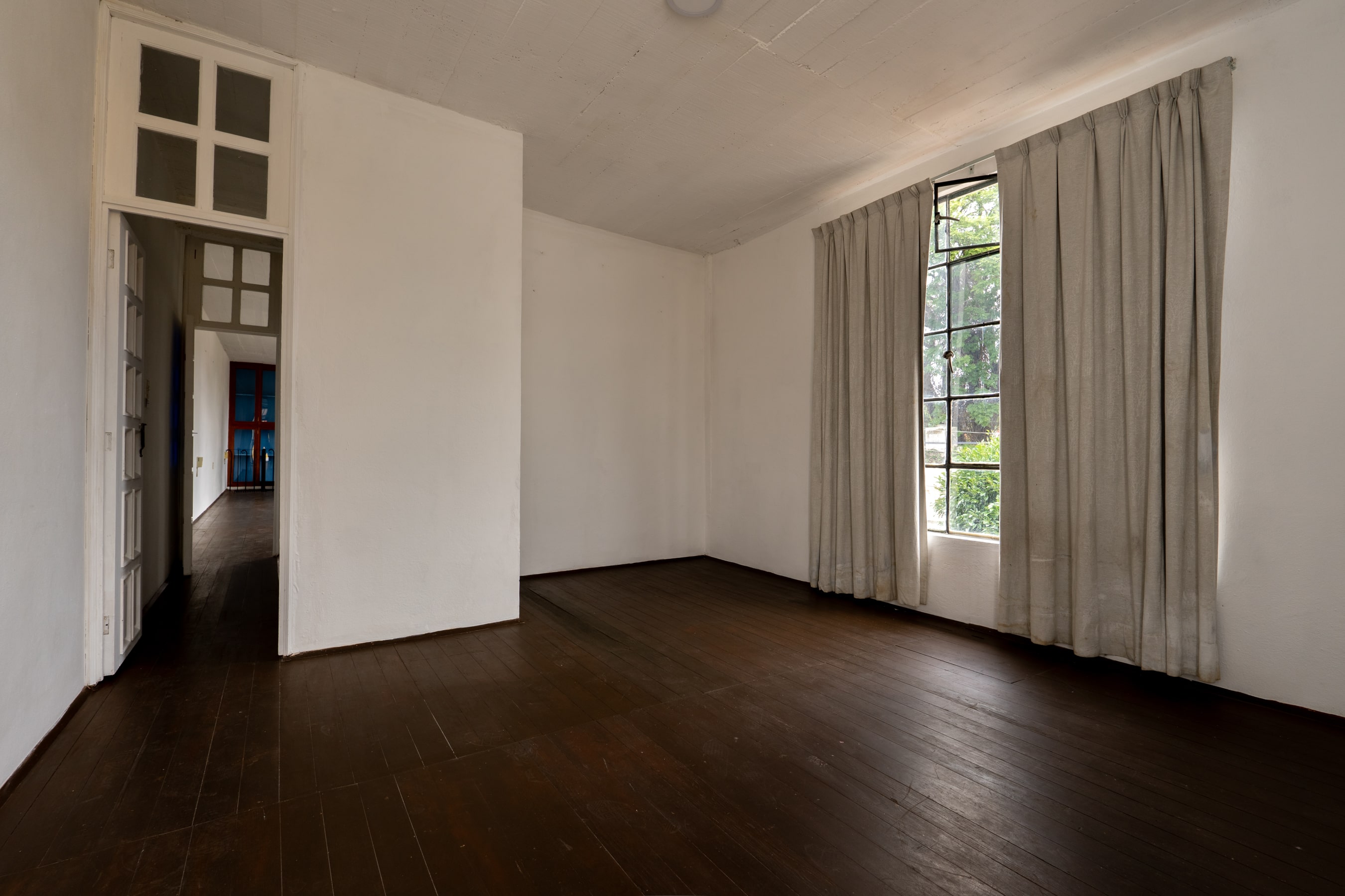 blue bedroom in casa yucatan, san felipe del agua, oaxaca