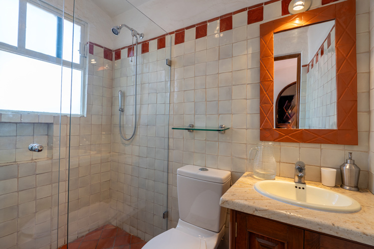 bathroom with white tiles