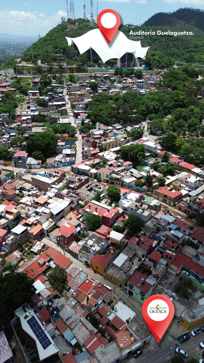 aerial photograph over el centro oaxaca with the guelaguetza auditorium nearby