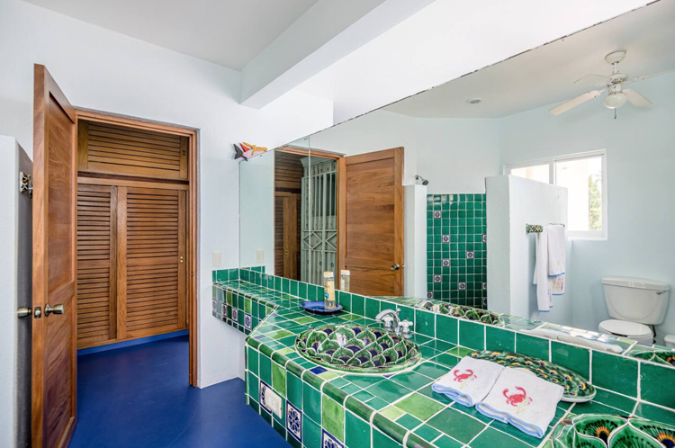 penthouse condo second bathroom with green tile