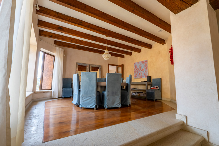 Dining room with wooden beamed ceiling