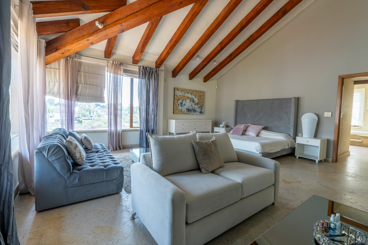 Living room with wooden beamed ceiling