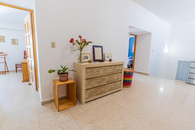 TV room on second floor between bedroom doorways