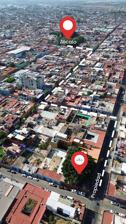 aerial photo showing property with storefronts near the zocolo of Oaxaca city