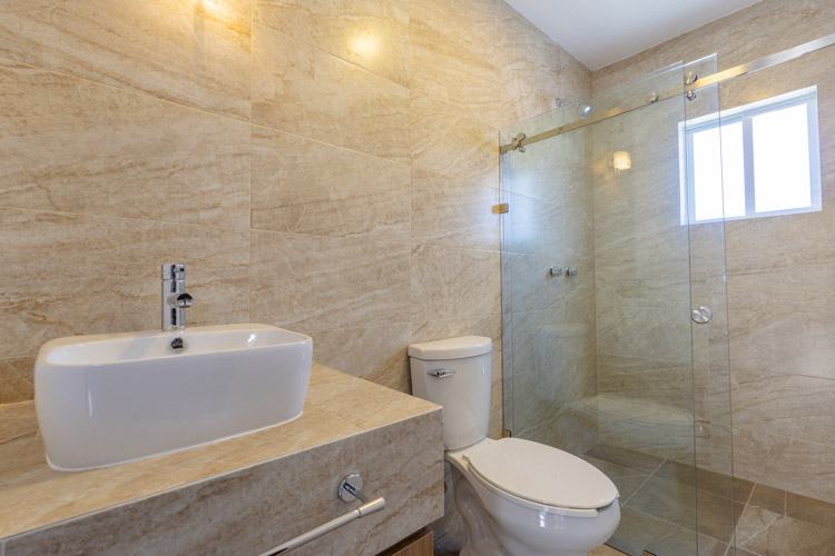 bathroom with beige tiles