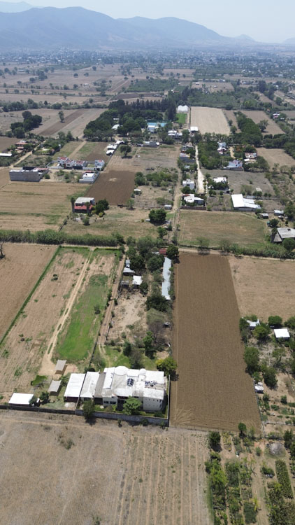 aerial photo showing private property for sale house and land terreno in tlalixtac de cabrera