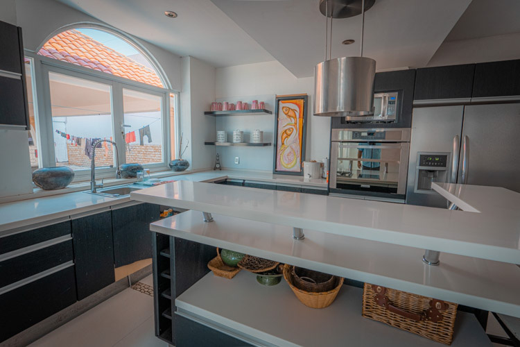 kitchen with island countertop and new appliances