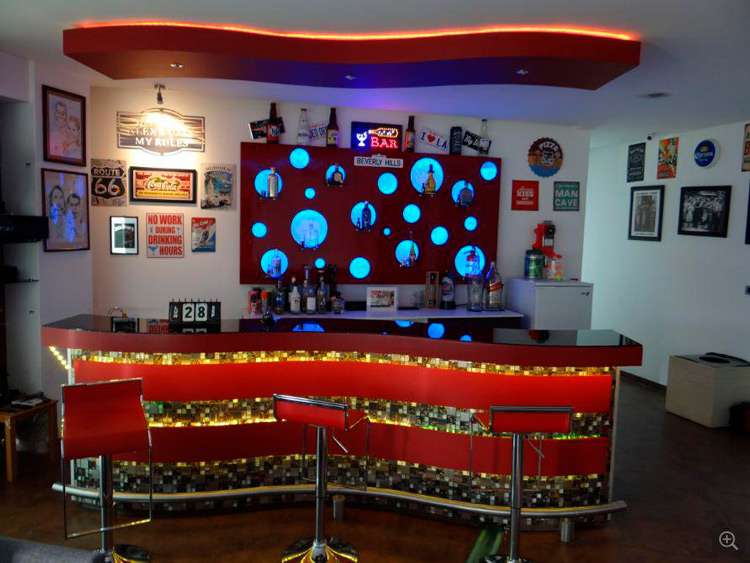 bar area with mirrors and wall decorations