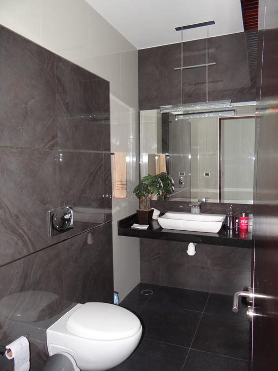 bathroom with grey tiles